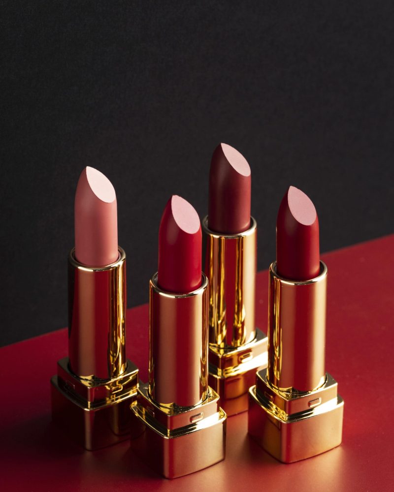 red-lipsticks-arrangement-high-angle-min